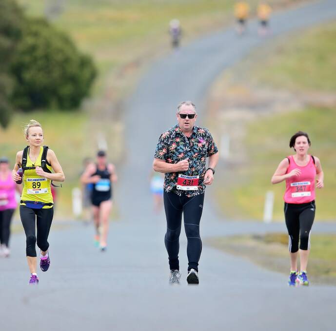 BIG EFFORT: Lucy Millwood, Peter Shepherd and Heather Reid competing in last year's Ross Marathons.