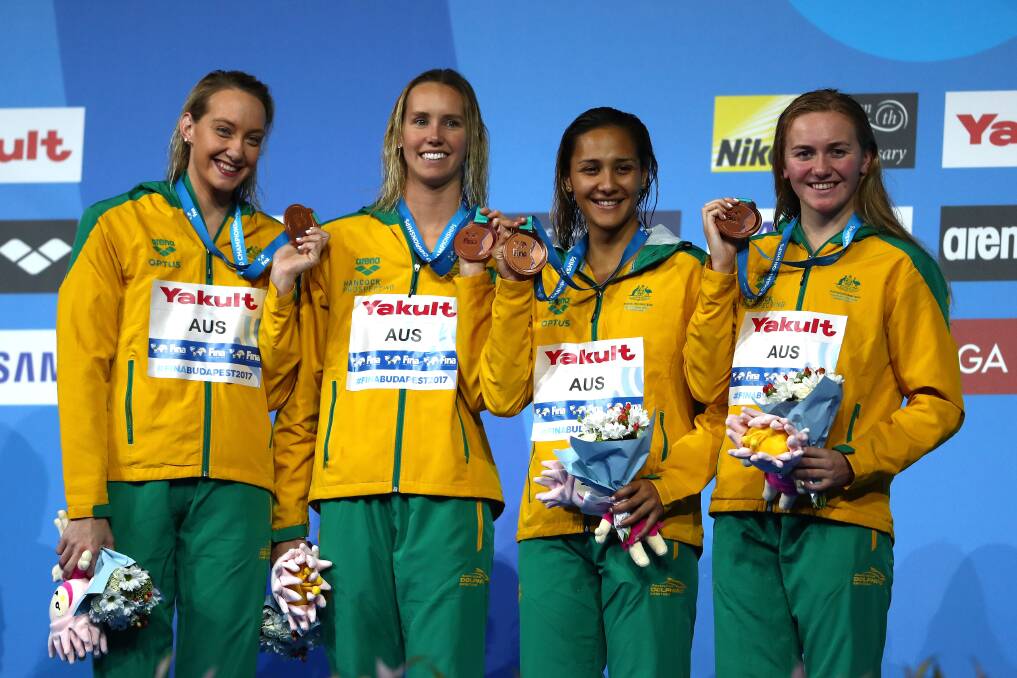 POWERING UP: Launceston's Ariarne Titmus (far right) has led Australia's 4x200m freestyle relay team to a bronze at the world championships in Budapest. Picture: Getty