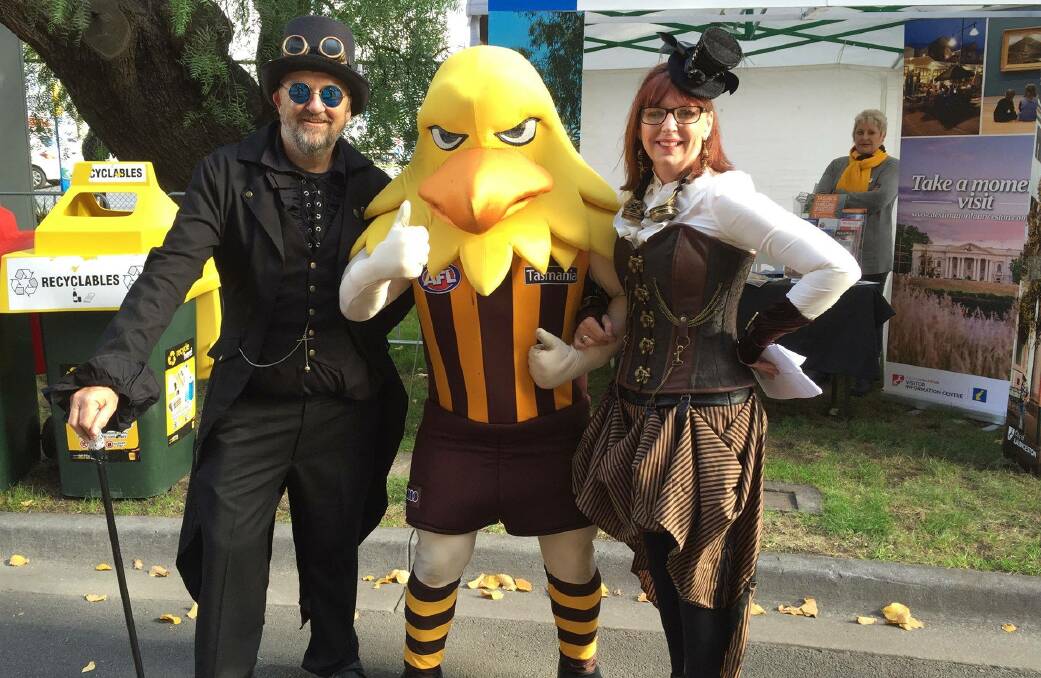 STEAM STARS: Air Vice-Marshal Alvin Bernhardt-Hansart and Missus Isabelle Peacock-Follywolle prepare for the Steampunk Festival with Hawka at Aurora Stadium earlier this month. Picture: Supplied