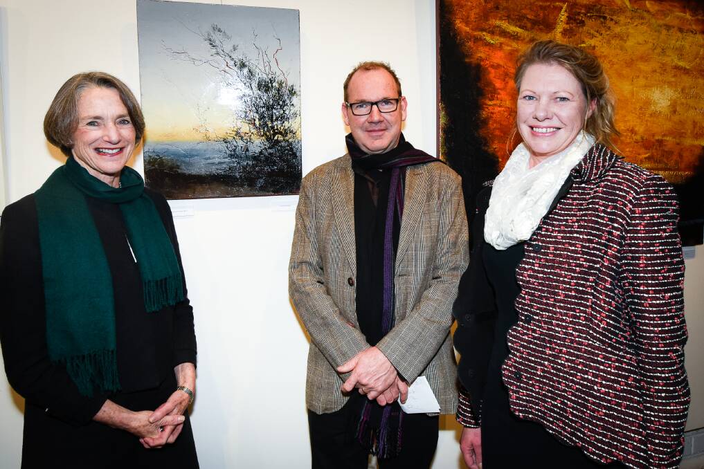 WINNER: Philip Wolfhagen is congratulated by Governor Kate Warner and Colville Gallery director Trudi Curtis. Picture: Amy Brown.