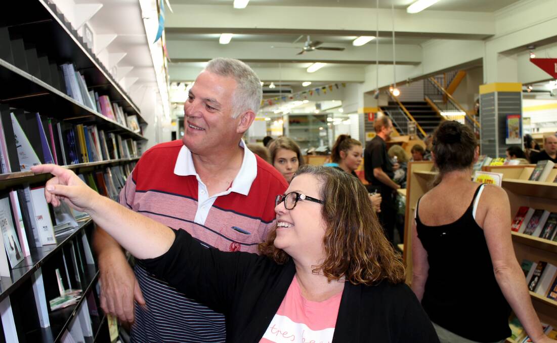 UNIQUE: Kings Meadows' Warren and Anita Reeve pay one last visit to Australia's oldest bookstore. Picture: Hamish Geale 