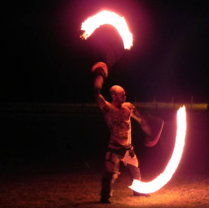 BRINGING THE HEAT: Fire twirler Andrew Trudgian performs at last year's WinterFire. Picture: Supplied
