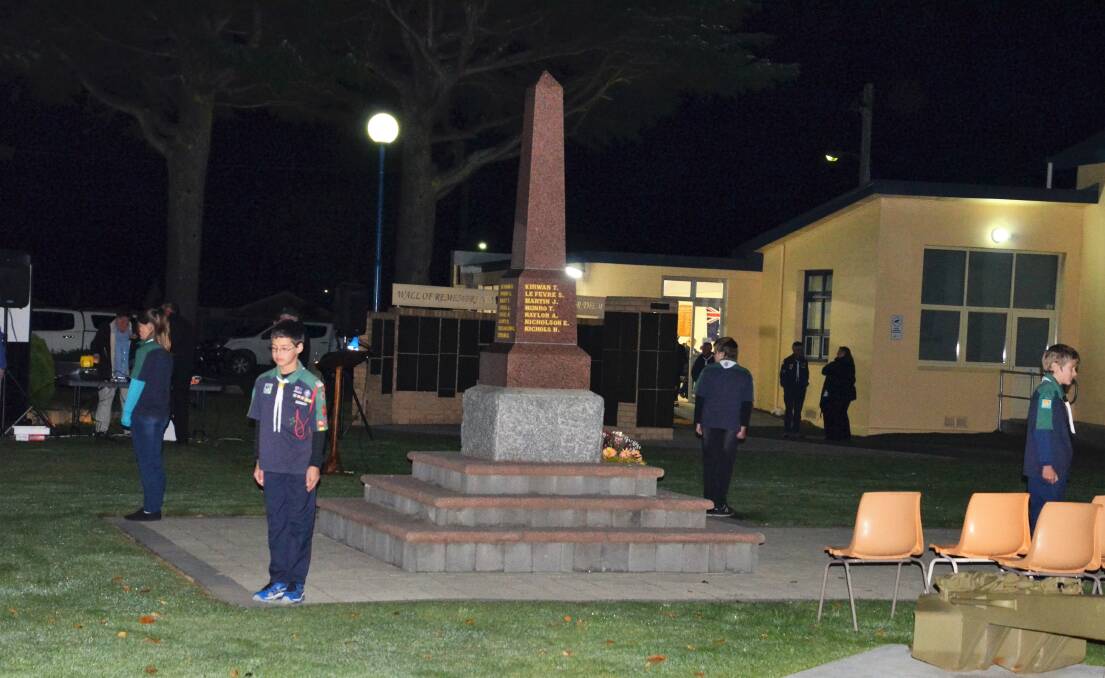 STANDING GUARD: Four St Helens scouts keep watch over the cenotaph before the Dawn Service on Monday. A team of 15 scouts manned the fort for 12 hours in the leadup to the service. 