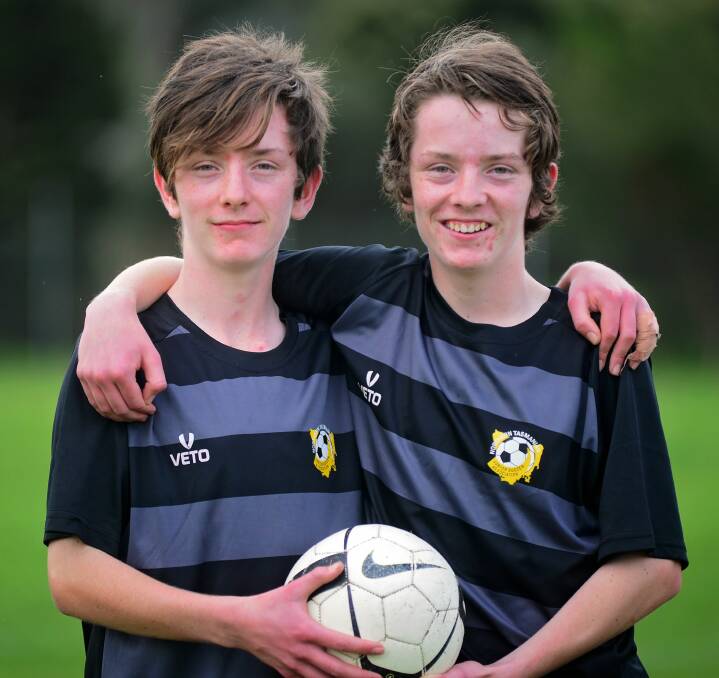 BROTHERS IN ARMS: Identical twins Josh and Connor Hannes are lining up for Launceston's under-13 black team at this weekend's NTJSA Launceston Tournament at Churchill Park. Picture: Phillip Biggs