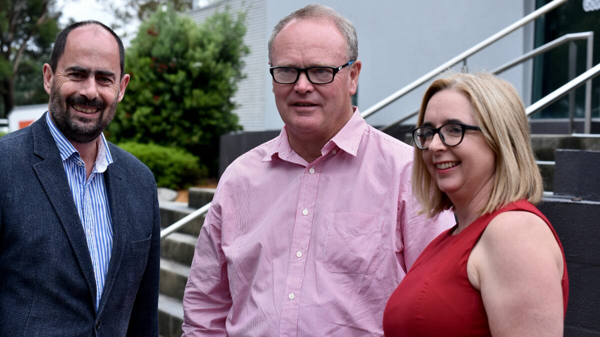 STANDING: Labor's Ross Hart and Michelle O'Byrne present Tasmanian sporting personality Brian Roe as Labor's Launceston candidate ahead of May's Upper House election. Picture Neil Richardson. 
