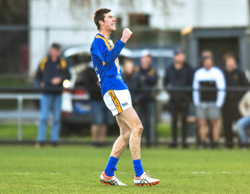 CELEBRATE GOOD TIMES: Evandale's Jackson Davey boots one of three goals to help the Country Eagles to a thrilling five-point win over Old Scotch. Picture: Scott Gelston.
