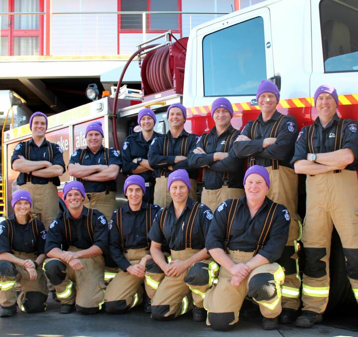 UNITED FORCE: Launceston Fire Brigade will be kitted out in purple beanies for the next week in an effort to raise $1500 for the Cure Brain Cancer Foundation. Picture: Hamish Geale