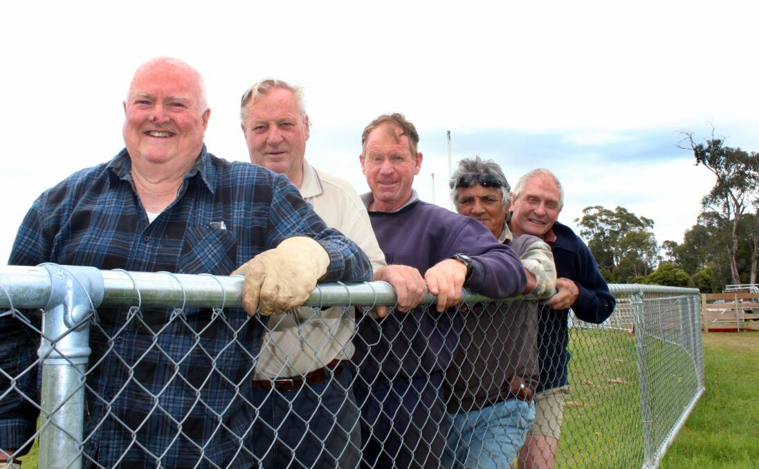FENCE ME IN: Exeter Show Society and Exeter Sheepdog Association members Rex Holzhauser, Peter Broad, Trevor Clark, Jim Yule and Alan Middleton inspect the new fence constructed for this year's sheepdog championships. Picture: Hamish Geale 