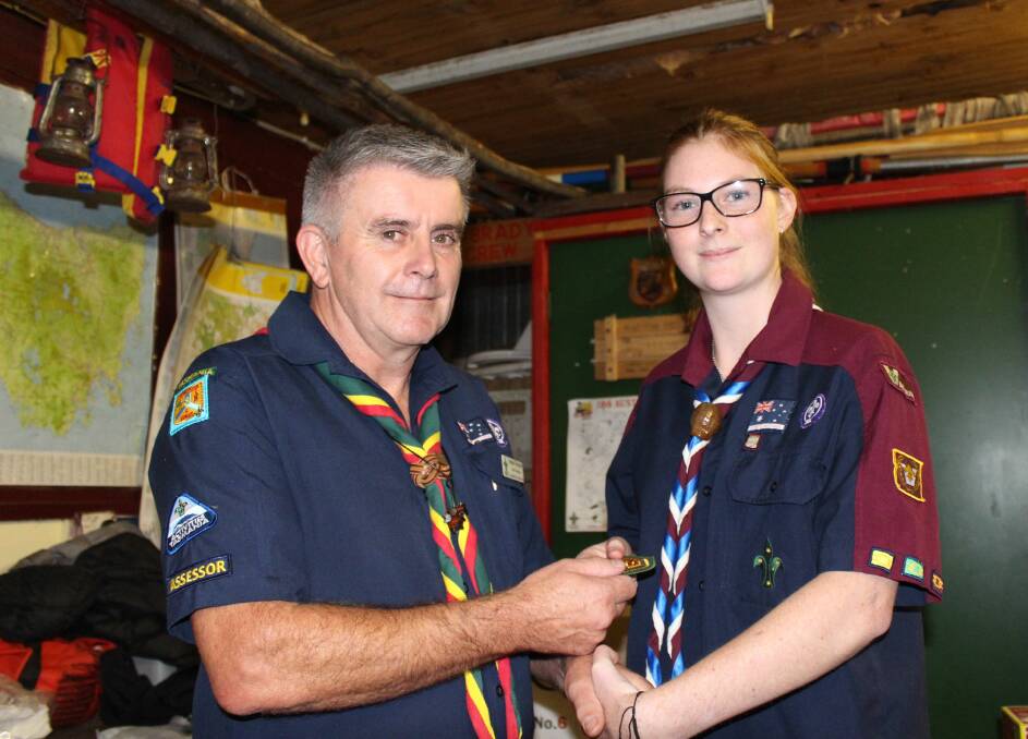 CROWNING CEREMONY: Launceston and Tamar scouts district commissioner Andrew Thompson presents the Queen Scout Award to Launceston's Amber Grosvenor. Picture: Hamish Geale 