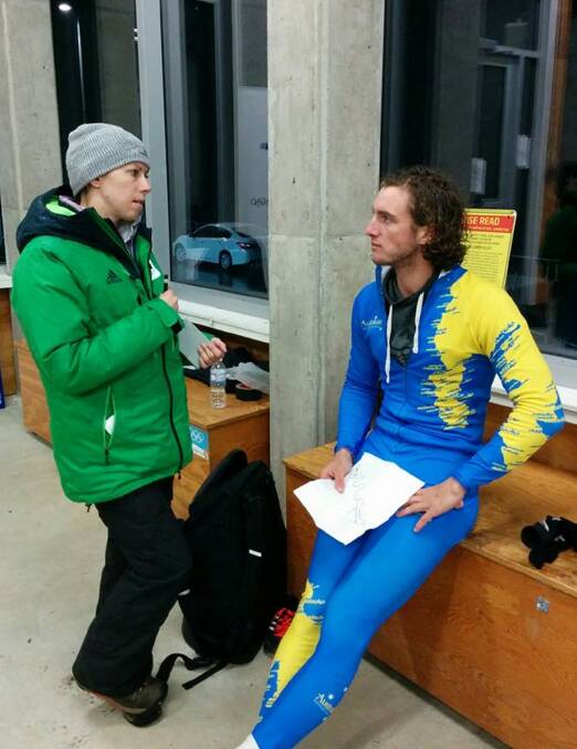 Focused: An IBSF coach provides Launceston rookie Tyler Heron with some feedback in Canada. Picture: Sliding Sports Australia