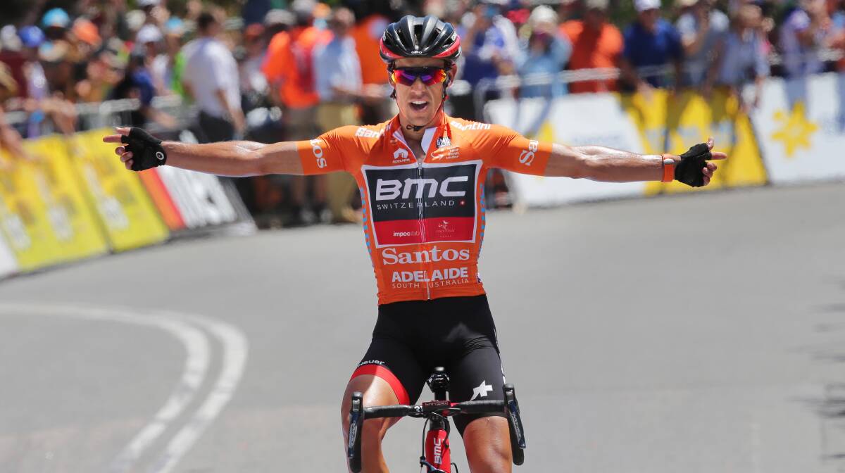 HAPPY CHAPPY: Porte crossing the finish line in Adelaide last year, winning the Queen stage during the Tour Down Under. Picture: John Veage