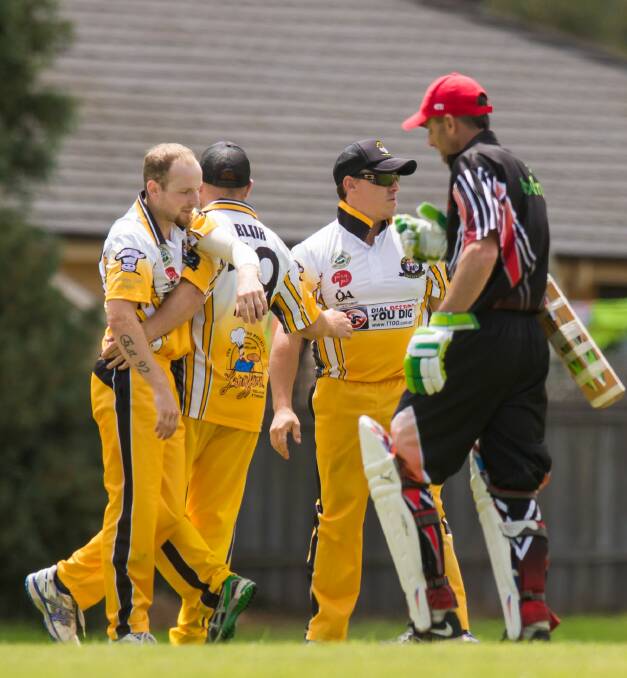 ON TOP: Longford celebrate the wicket of Hadspen batsman Nathan Balym last week. The Country Tigers are seven-points clear in first position. Picture: Phillip Biggs