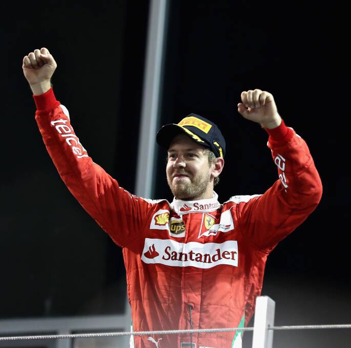 MONEY MAN: German Ferrari driver Sebastian Vettel is paid $50 million a year excluding bonuses. Picture: Getty Images 