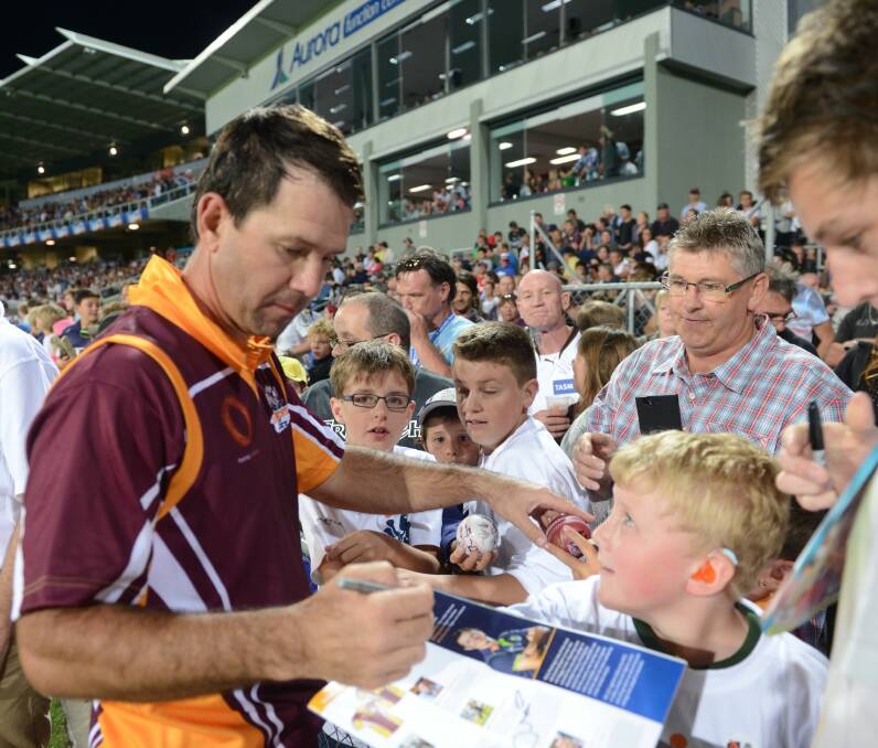 OH WHAT A NIGHT: Mowbray cricket legend Ricky Ponting signing autographs at the end of his testimonial in Launceston in January, 2014. Almost 18,000 people attended what many consider the city's greatest sporting event.