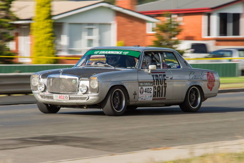 ZOOM: Joe Caudo and Ivan Limb race their 1971 280ce Mercedes through the streets of George Town during day 2 of Targa Tasmania competition. Pictures: Phillip Biggs 