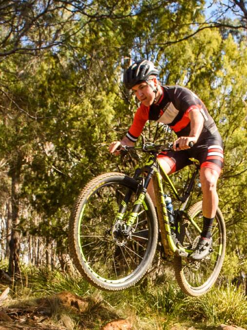 RIDING HIGH: Launceston's Alex Lack had a fantastic ride during the national mountain biking cross country series' fourth round in Queensland on the weekend. He finished fifth in the elite men's class. Picture: Scott Gelston 