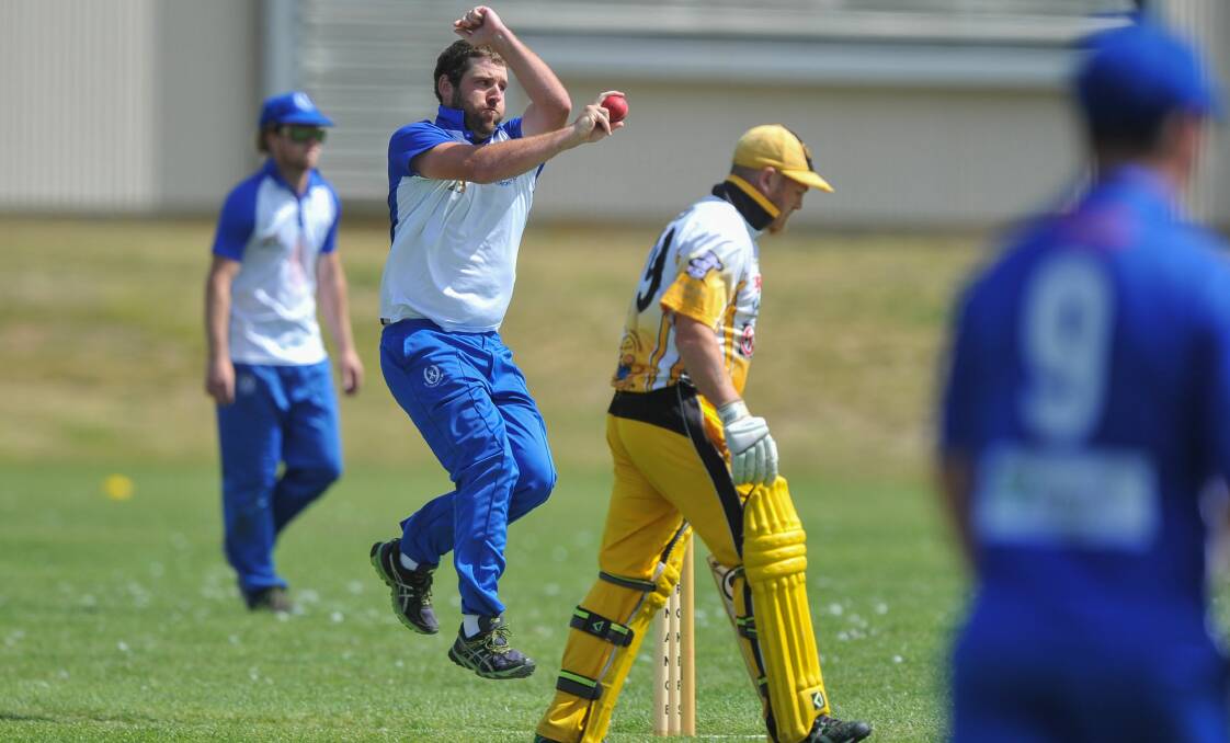 FOCUSED: ACL's Brendan Reid bowls from the southern end at University Oval against Longford. Picture: Scott Gelston