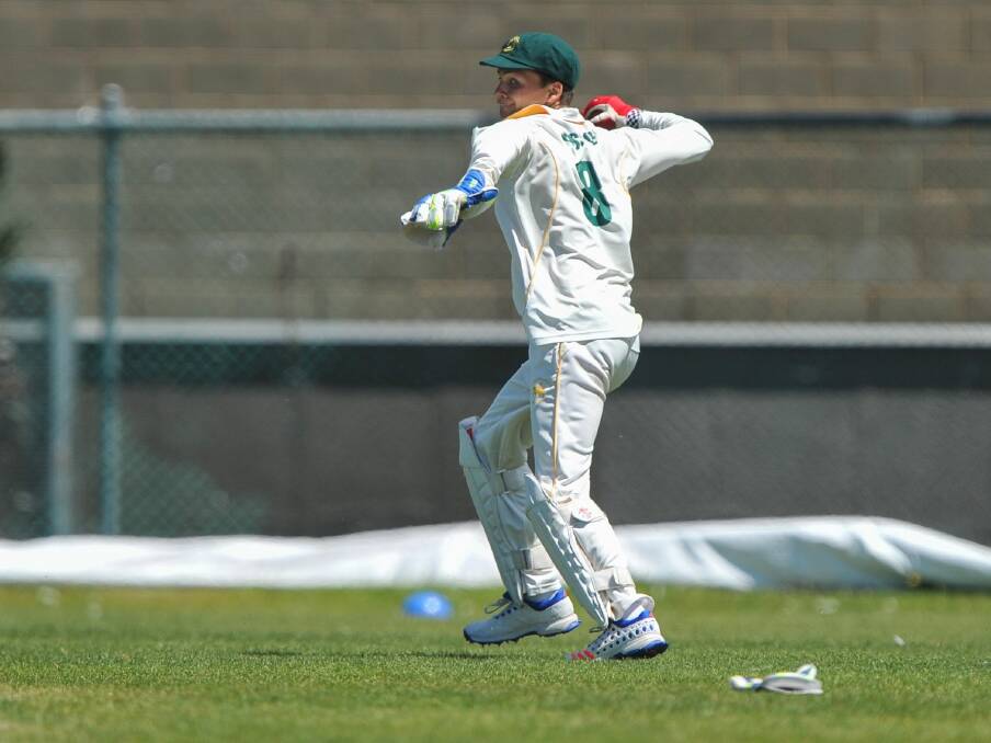 LOOKOUT: South wicket-keeper Charlie Eastoe throws the ball back after chasing it down.