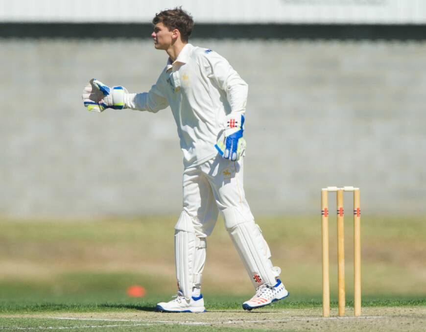 SIGNAL: South Launceston wicket-keeper Charlie Eastoe mid over.
