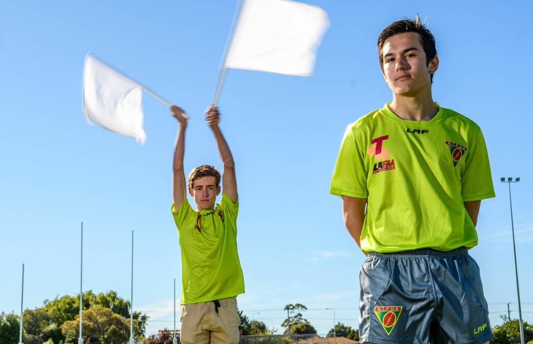 LOCATION, LOCATION: Northern Tasmanian goal umpire Will Robertson and boundary umpire Nick Jordan at their new Prospect Park home. The NTFUA has relocated from their base at UTAS Stadium. Picture: Scott Gelston