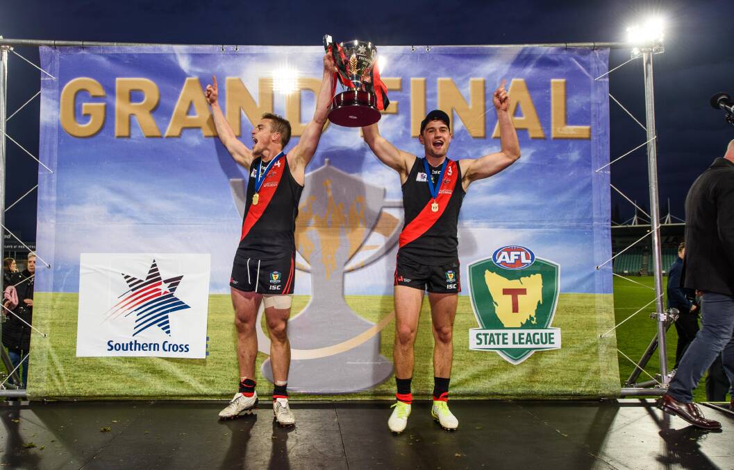 SWITCHEROO: North Launceston coach Tom Couch and captain Taylor Whitford lift the 2016 TSL premiership cup. 