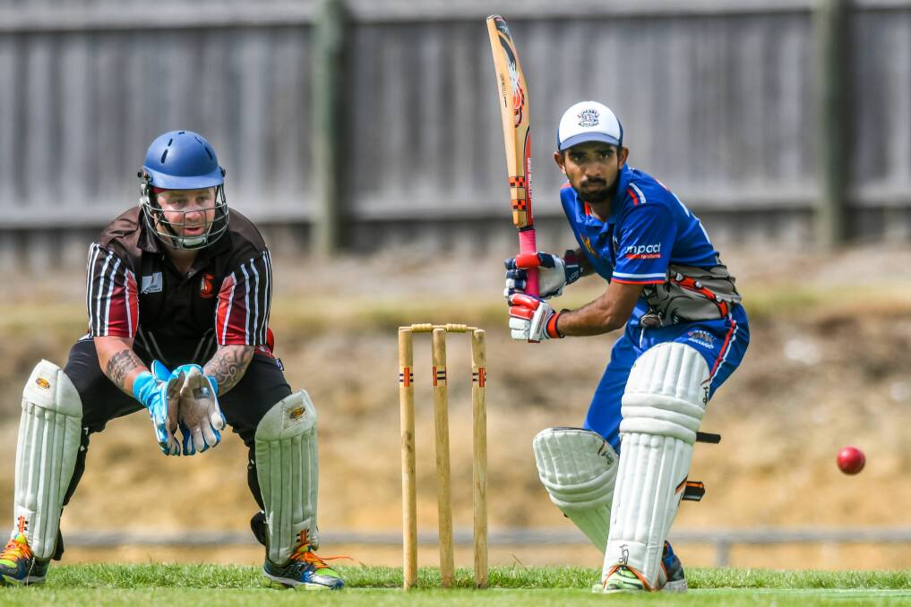 WATCHFUL: Chieftians wicketkeeper Damian Woods and Cressy batsman Varun Nadesh in action.