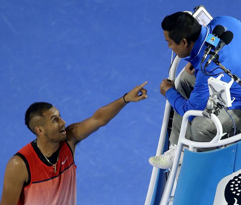 CHILDISH: Australia's Nick Kyrgios argues with the main chair umpire during his third round match against Tomas Berdych at the 2016 Australian Open. Picture: Getty Images.
