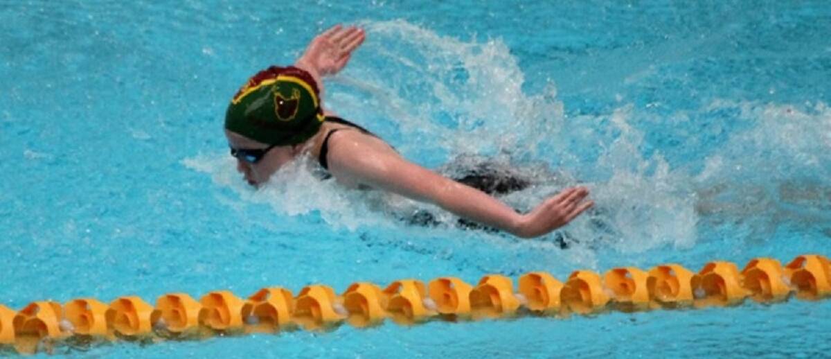 Savage competes in the open 200-metres butterfly.