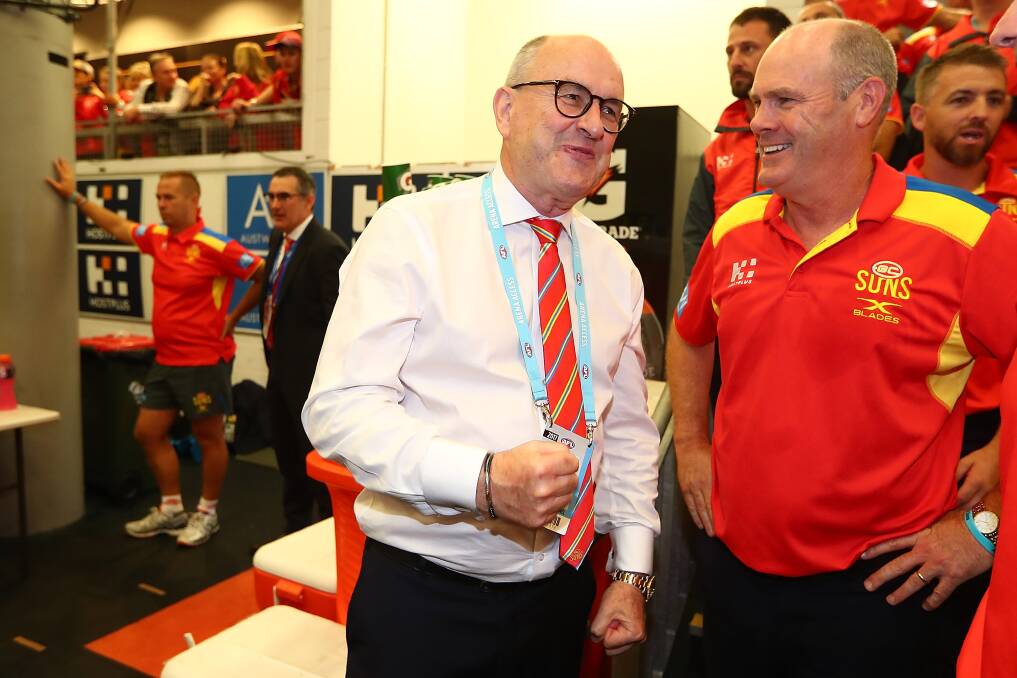 WANT TO MOVE BACK HOME ROCKET?: Gold Coast chairman Tony Cochrane with Tasmanian Suns coach Rodney Eade. Picture: Getty Images