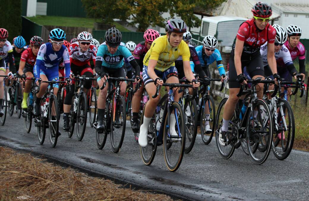 Champion: Mersey Valley Tour winner Kate Perry rides with the peloton on day three in cold, wet and windy conditions. Pictures: Caitlin Johnston/Cycling Australia.
