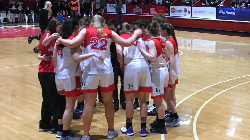 Launceston Tornadoes gather in the pre-game huddle before their south conference final against Kilsyth on Saturday night in Melbourne. Picture: Jordie Gray
