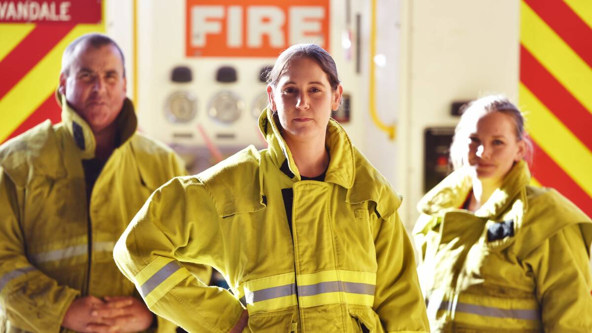 Evandale firefighter Danni Shaw is flanked by brigade chief Grant Rigby and firefighter Alicia Styles. Danni is off to compete in the Melbourne Firefighter Stair Climb. Picture: Scott Gelston