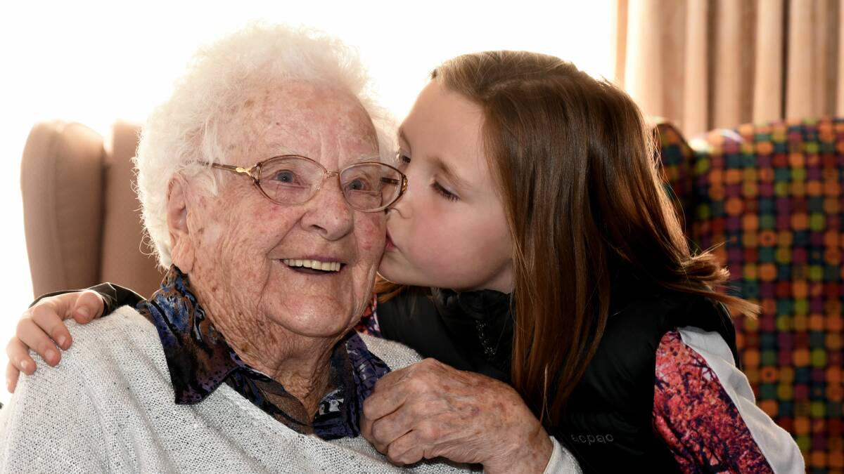 Great great grand daughter Rochelle Atkins gives Iris Roden a kiss. Iris celebrated her 105th birthday yesterday. Picture: Neil Richardson
