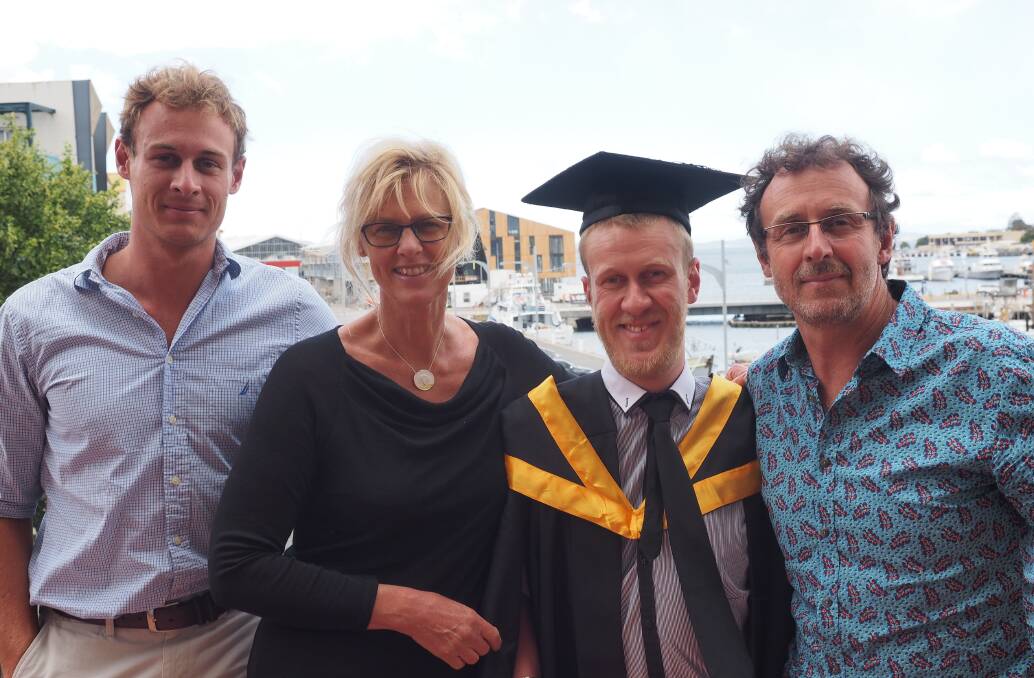 SEARCHING: Sam Flood, second from right, with brother Ben (left), mum Wendy, and dad Chris, at Sam's graduation in 2016. Picture: supplied