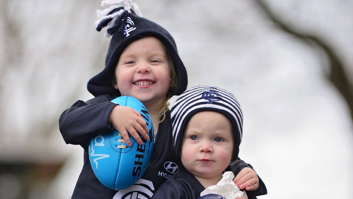 Carlton fans Lexie  and Ryder Rowbottom of Newnham are ready to see their Blues clash with the Hawks at Aurora Stadium. Picture: Phillip Biggs