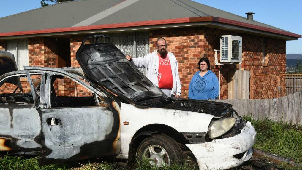Grant and Melissa Battye are calling for "more police patrols" in their neighbourhood after a car crashed through their fence overnight. Picture: Neil Richardson