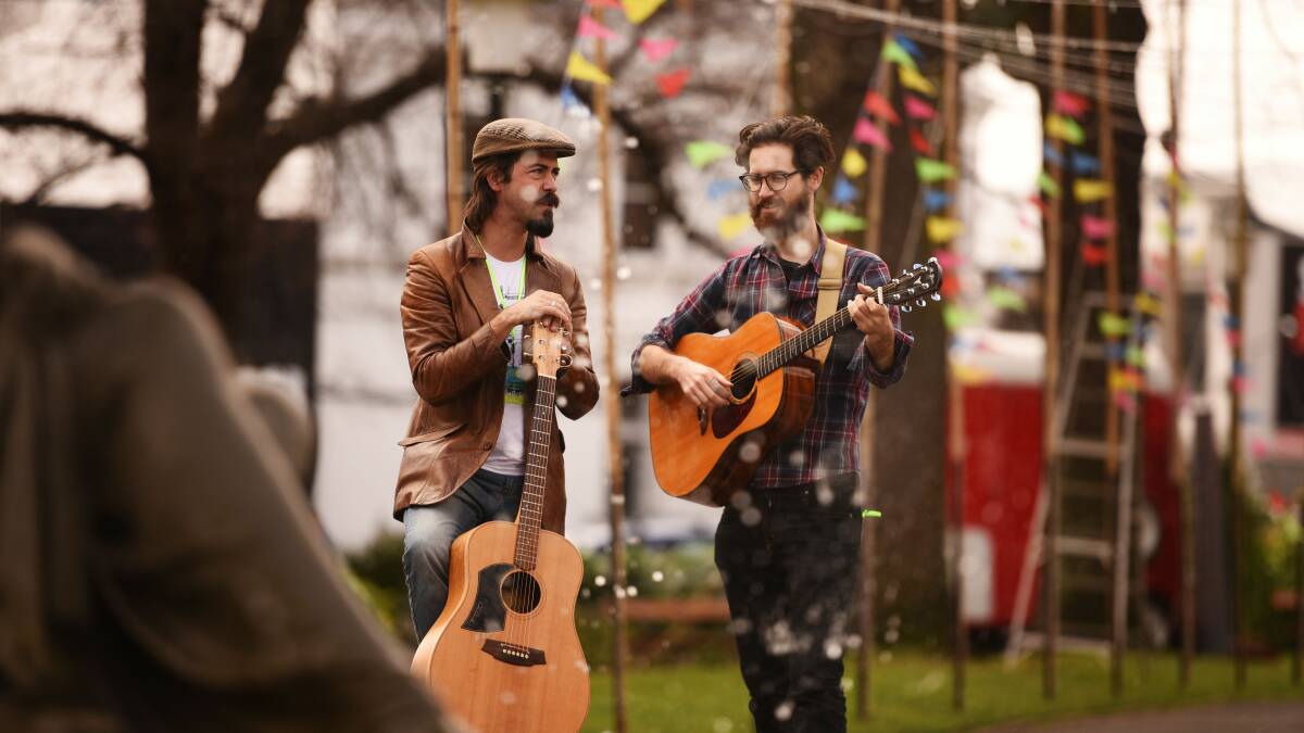 Songwriter Daniel Townsend and singer John Flanagan rehearse in Princes Square for Junction Festival. Picture: Scott Gelston
