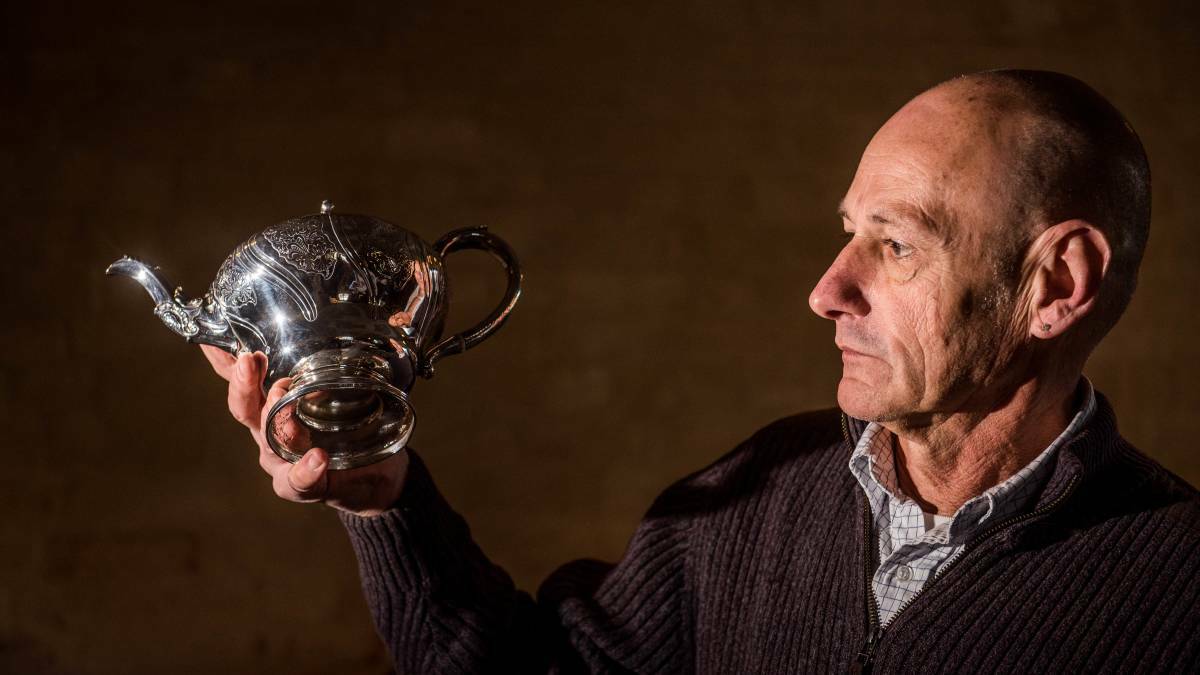 Tasmanian Antique Fair co-coordinator Robert Henley says for every Scottish silver teapot, 100 English teapots were made, which made this 1836 teapot created by Robert Gray and Son special. The decorations would have been done by hammering and chiseling, he says.