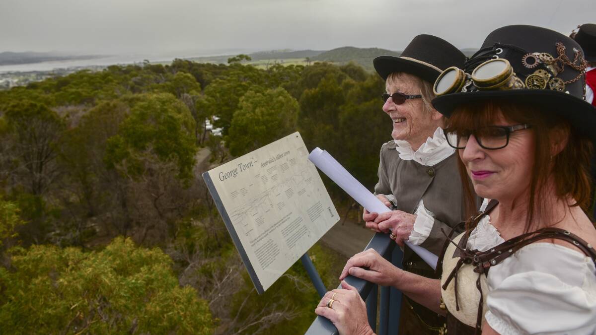 George Town Steampunk Tasmania Festival committee members  Rhonda O'Sign and  Anne Cameron at the Mt George lookout at George Town. The festival is gearing up to take place this Saturday. Picture: Paul Scambler. Click to read more