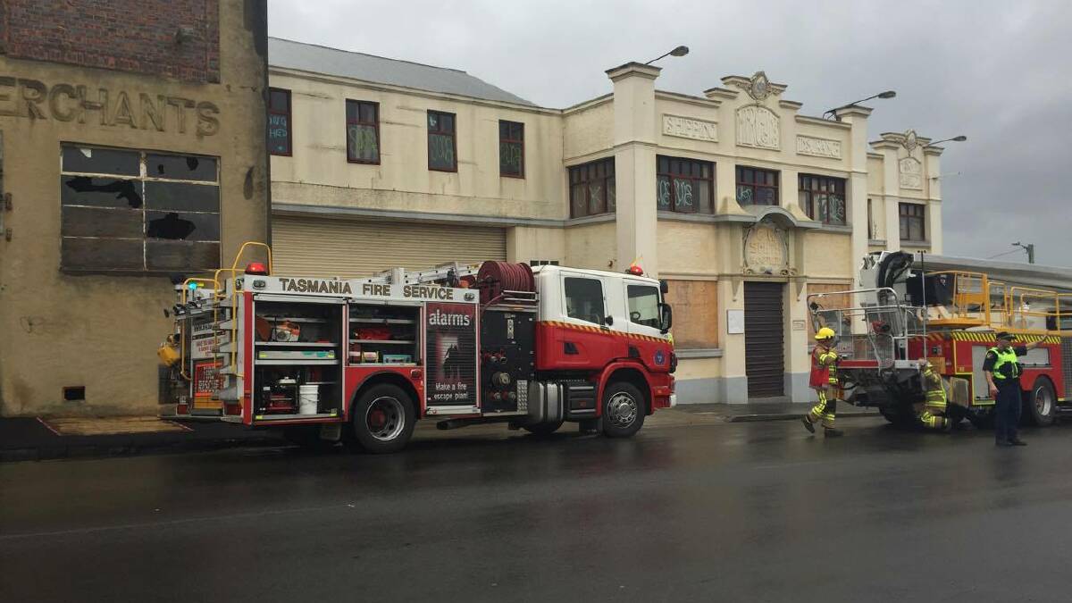Fire crews on the scene of a reported fire at the C.H Smith building in Launceston. Picture: Melissa Mobbs