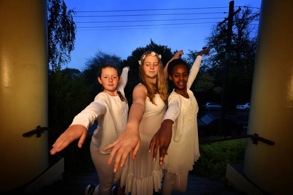REMEMBERING: Dance Connection performers Mary Bradfield, 11, Claire Imlach, 14 and Lilly Donovan, 10, will dance at the candle lighting ceremony. Picture: Scott Gelston.