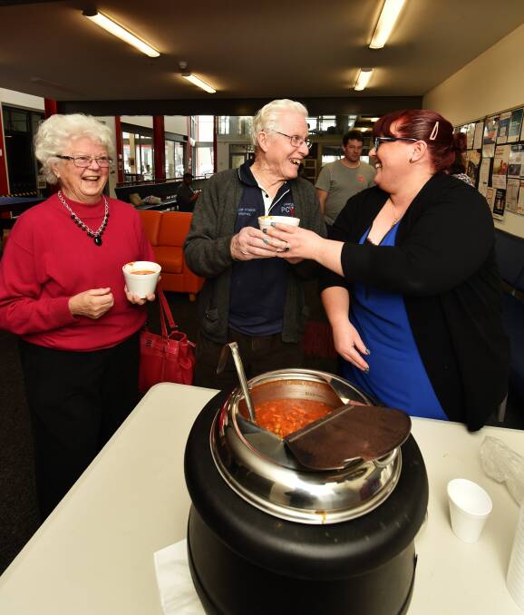 SOUP-ER: Launceston's Margaret and Murray Earnshaw get a hot bowl of soup from Salvation Army Employment Plus site manager Charlie Shaw. Picture: Scott Gelston