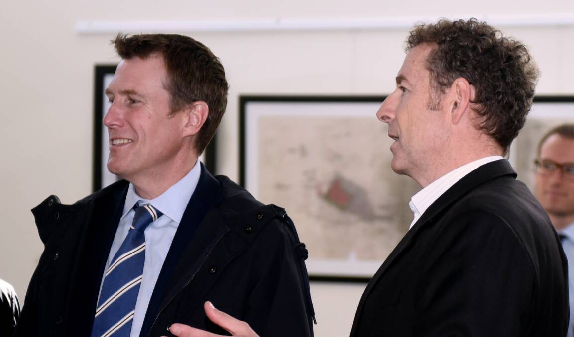 In town: Social Services Minister Christian Porter being shown around St Michaels Association by chief executive John Gilpin on Wednesday. Picture: Neil Richardson. 