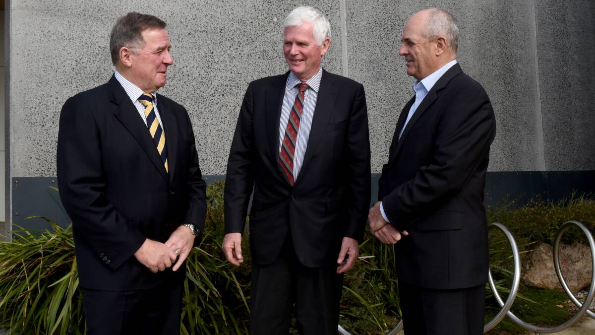 Taswater chairman Miles Hampton with TasWater owners representative group chief David Downie and Local Government Association of Tasmania president Doug Chipman. 