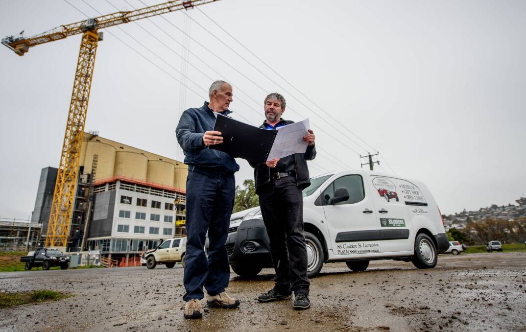FUTURE: National Automobile Museum Of Tasmania chairman Harry Williscroft and manager Phil Costello look at the Lindsay Street site the museum will move into. Picture: Scott Gelston. 