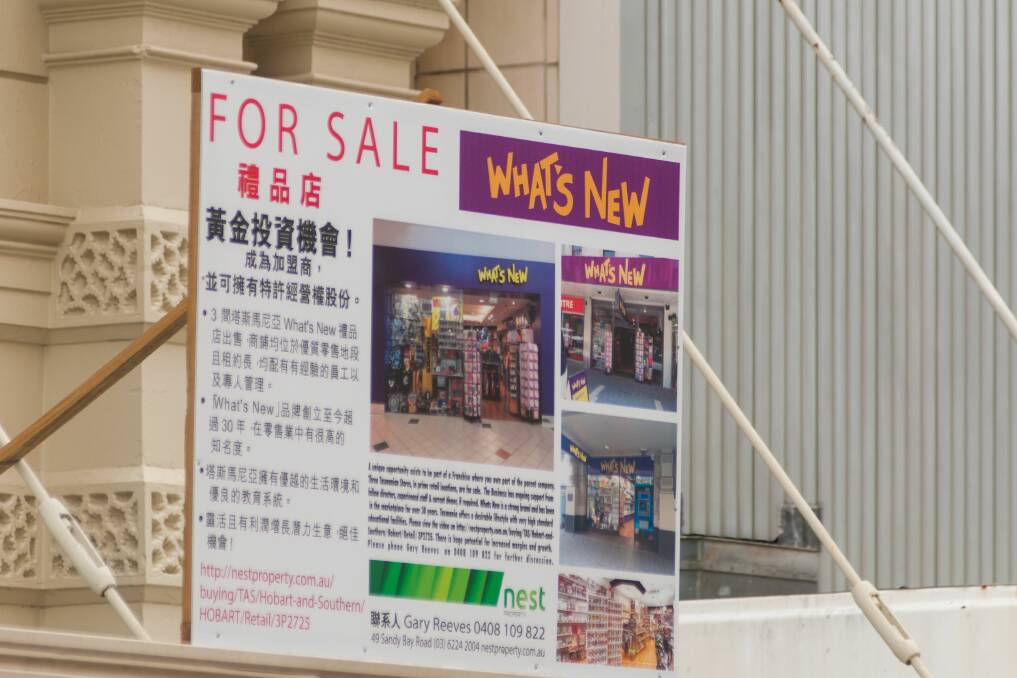FOREIGN: What's New in the Brisbane Street Mall has been advertised for sale in Mandarin. Picture: Phillip Biggs 