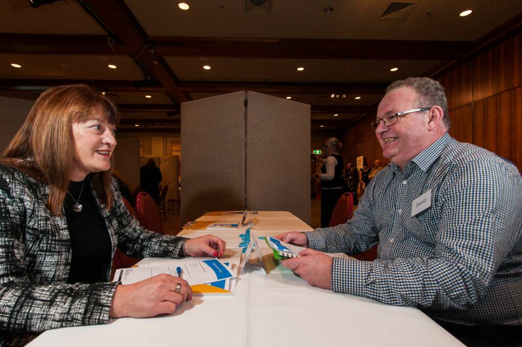 HIRE: Sharon Curran from Morty's cleaning speaks with job seeker David Murray at the WISE speed interview event. Picture: Phillip Biggs 
