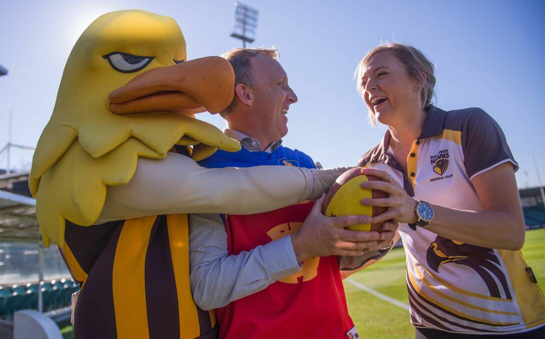 READY: Hawka, Meander Valley mayor Craig Perkins and Northern Hawks netball side captain Ashton Whiley call on people to support Saturday's match. Picture: Scott Gelston. 