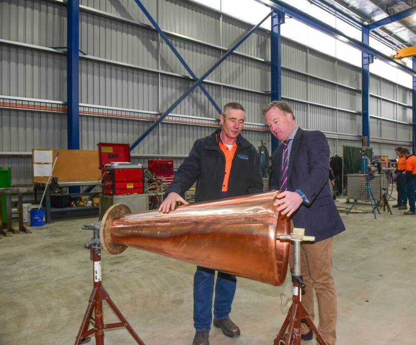 COPPER: Premier Will Hodgman and Kolmark managing director Mark Kolodziej at the opening of the company's new Westbury facility on Wednesday. Picture: Paul Scambler