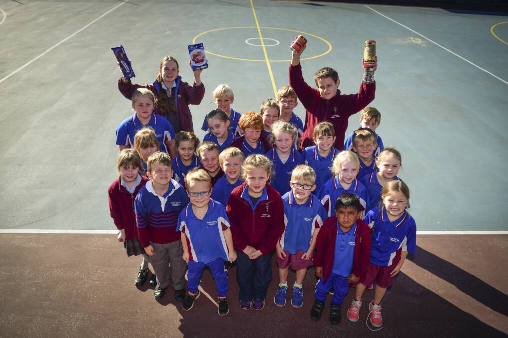 DONATE: Punchbowl Primary School Prep 1 students with student leaders Dylan Perkins and Ruby Monson. Picture: Paul Scambler 